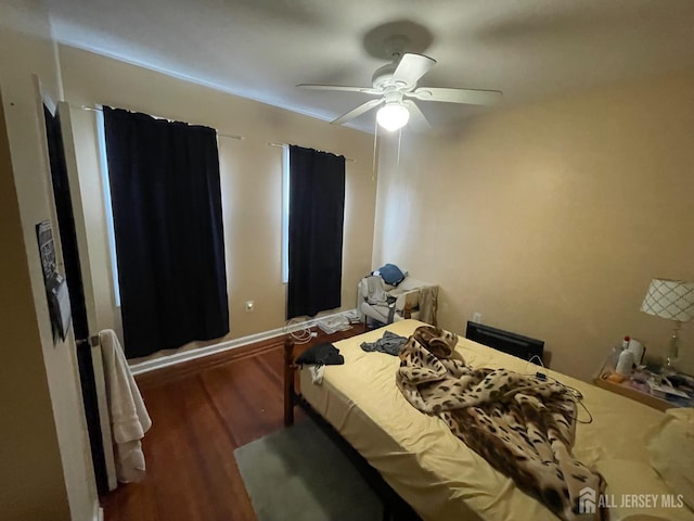 18 Bethany St, New Brunswick, NJ 08901 - bedroom with wood finished floors and ceiling fan