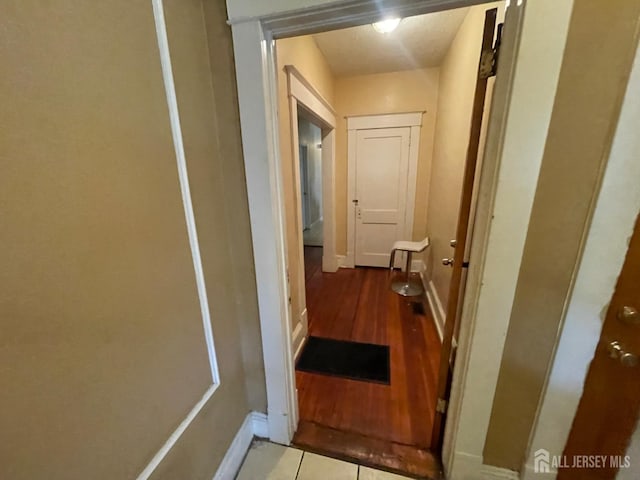 18 Bethany St, New Brunswick, NJ 08901 - hallway featuring baseboards and wood finished floors