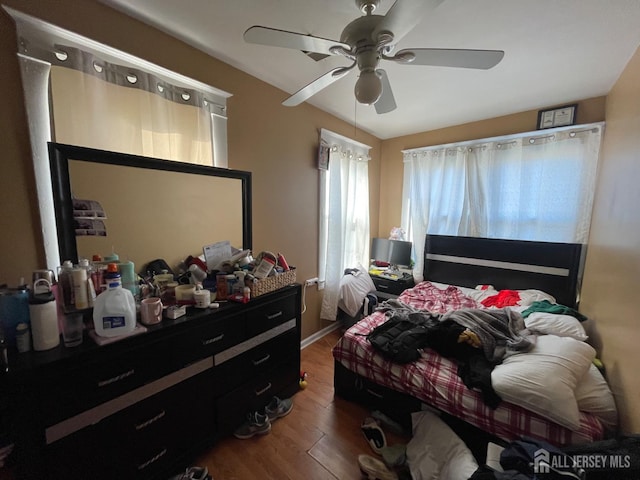 18 Bethany St, New Brunswick, NJ 08901 - bedroom with wood finished floors and ceiling fan