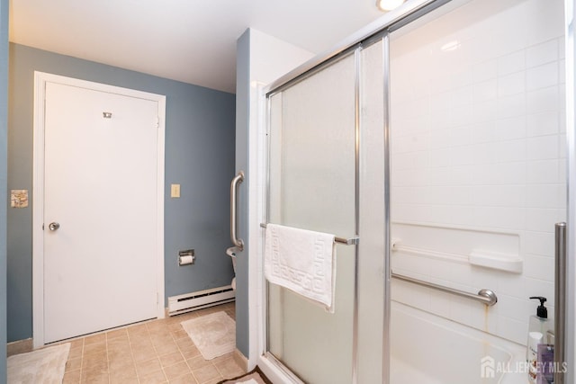 bathroom with tile patterned flooring, a baseboard radiator, and walk in shower