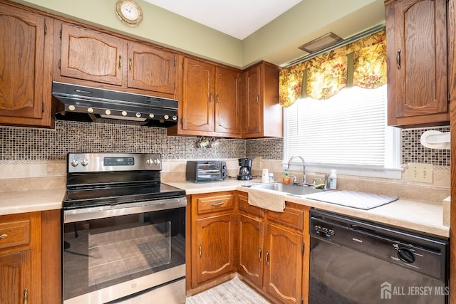 kitchen with tasteful backsplash, black dishwasher, sink, and stainless steel electric range