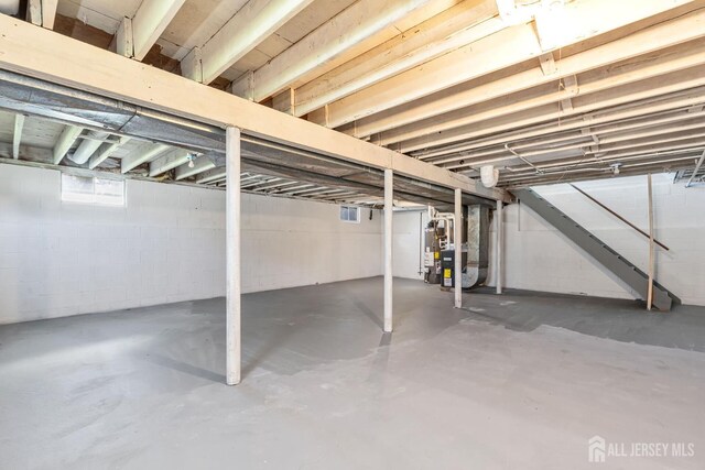 141 Day St, South Plainfield, NJ 07080 - below grade area featuring gas water heater and concrete block wall