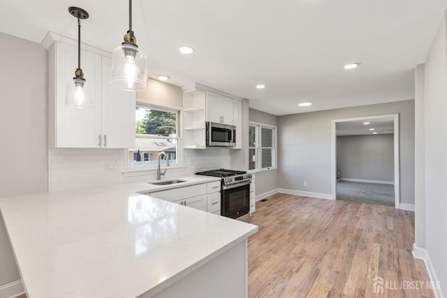 141 Day St, South Plainfield, NJ 07080 - kitchen featuring stainless steel appliances, a sink, decorative backsplash, recessed lighting, and white cabinetry