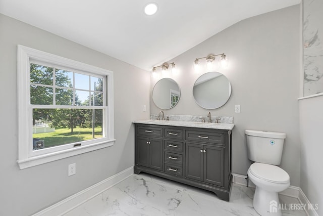 141 Day St, South Plainfield, NJ 07080 - bathroom with lofted ceiling, marble finish floors, double vanity, baseboards, and toilet