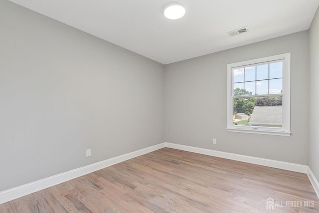 141 Day St, South Plainfield, NJ 07080 - empty room with baseboards and light wood-type flooring