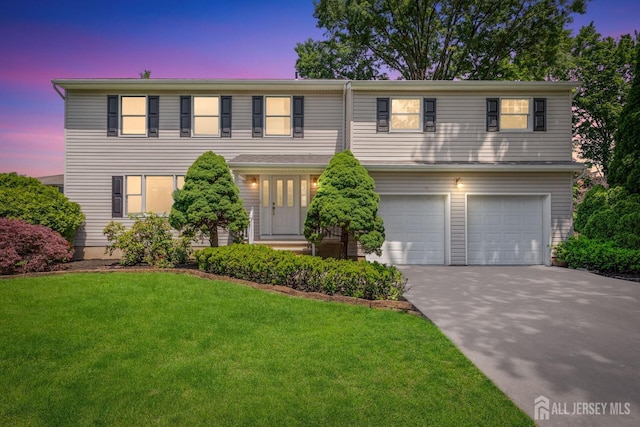 141 Day St, South Plainfield, NJ 07080 - view of front of property featuring a garage, concrete driveway, and a front yard