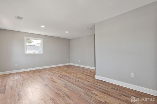 141 Day St, South Plainfield, NJ 07080 - empty room with light wood-style floors, baseboards, and recessed lighting