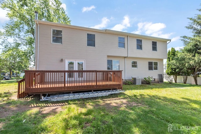141 Day St, South Plainfield, NJ 07080 - rear view of property featuring a deck, central air condition unit, and a lawn