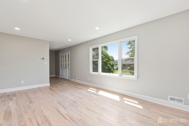 141 Day St, South Plainfield, NJ 07080 - empty room with light wood-style flooring, baseboards, and recessed lighting