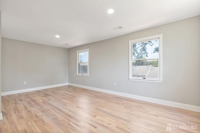 141 Day St, South Plainfield, NJ 07080 - unfurnished room with plenty of natural light, baseboards, light wood finished floors, and recessed lighting
