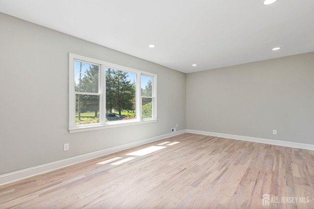 141 Day St, South Plainfield, NJ 07080 - spare room with light wood-type flooring, baseboards, and recessed lighting