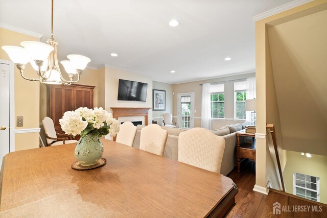4 Sandra Ct Unit 2743, Old Bridge, NJ 08857 - dining area with ornamental molding, a chandelier, dark wood-style flooring, and recessed lighting