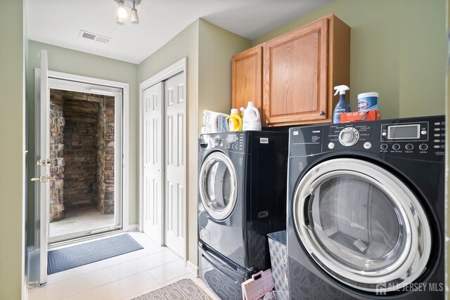 4 Sandra Ct Unit 2743, Old Bridge, NJ 08857 - laundry area with separate washer and dryer, cabinet space, light tile patterned floors, and baseboards