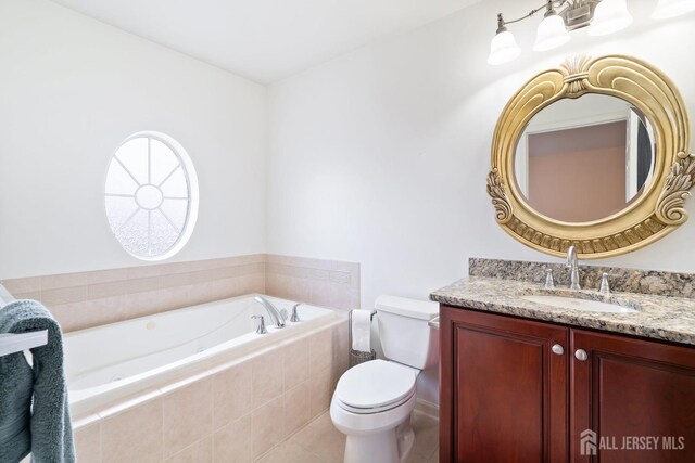 4 Sandra Ct Unit 2743, Old Bridge, NJ 08857 - full bathroom featuring a tub with jets, vanity, and toilet