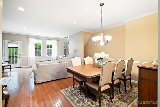 4 Sandra Ct Unit 2743, Old Bridge, NJ 08857 - dining room with light wood finished floors, a chandelier, ornamental molding, baseboards, and recessed lighting