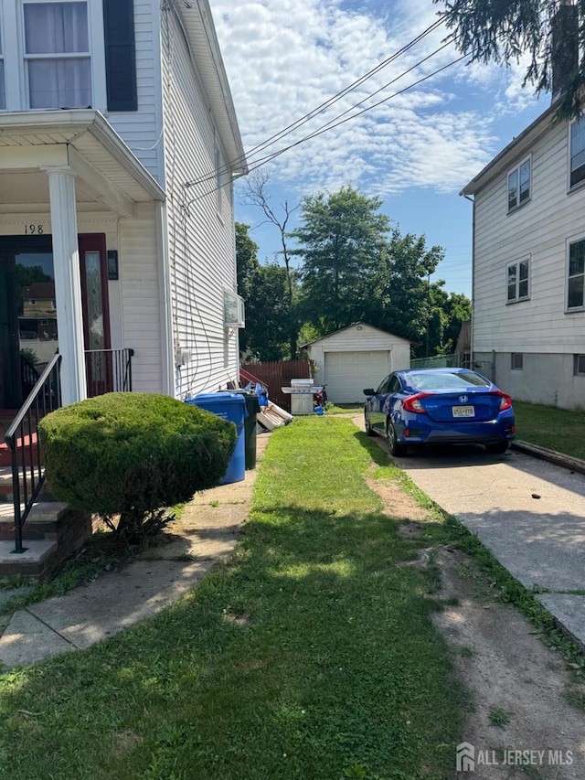 198 Strawberry Hill Ave, Woodbridge Proper, NJ 07095 - view of side of property with a garage, a lawn, and an outdoor structure
