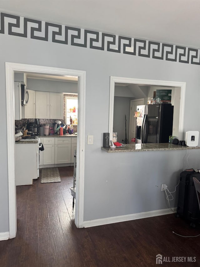 198 Strawberry Hill Ave, Woodbridge Proper, NJ 07095 - kitchen with black refrigerator with ice dispenser, dark wood-type flooring, and white cabinets