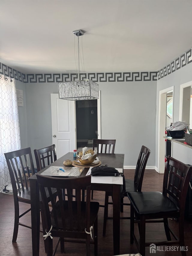 198 Strawberry Hill Ave, Woodbridge Proper, NJ 07095 - dining room with dark wood finished floors and baseboards