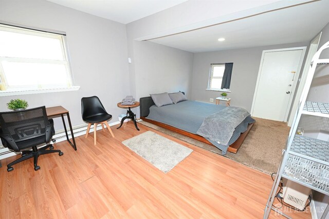 bedroom featuring wood finished floors