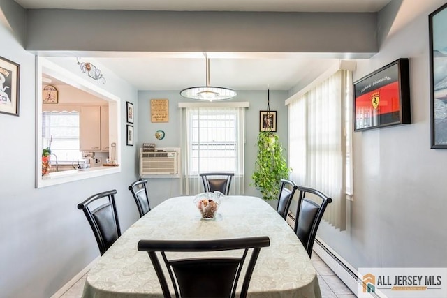 1 Berkley Blvd, Iselin, NJ 08830 - dining room featuring a baseboard heating unit, healthy amount of natural light, and tile patterned flooring