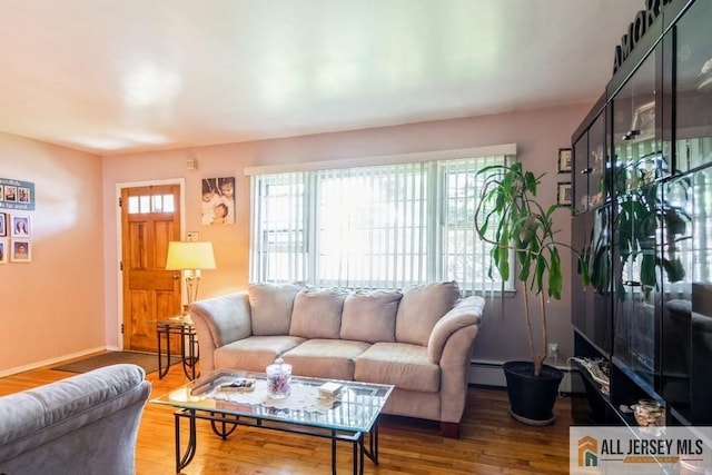 1 Berkley Blvd, Iselin, NJ 08830 - living room featuring wood finished floors, baseboards, and a baseboard radiator
