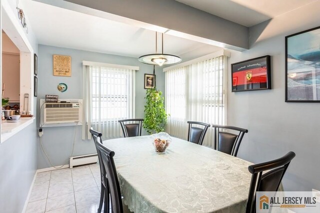 1 Berkley Blvd, Iselin, NJ 08830 - dining area with a baseboard radiator and baseboards