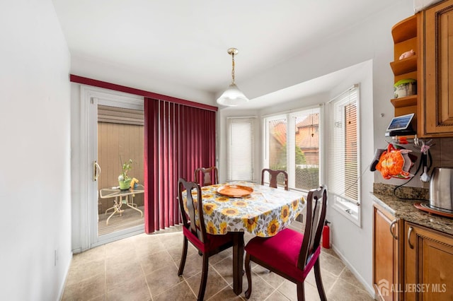 66 Riverbend Dr, North Brunswick, NJ 08902 - dining space featuring light tile patterned floors