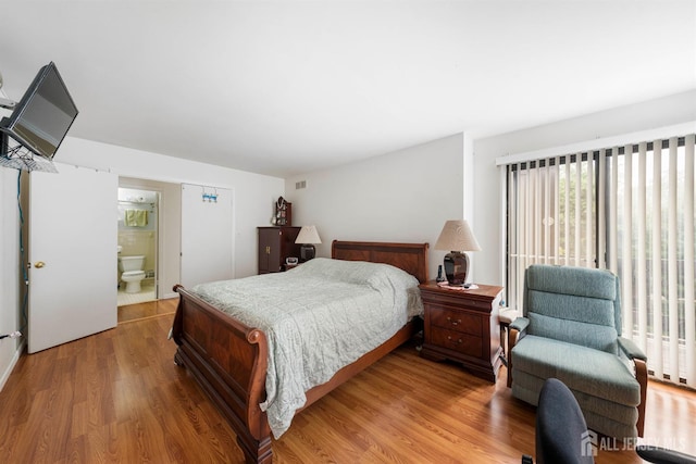 66 Riverbend Dr, North Brunswick, NJ 08902 - bedroom featuring wood finished floors and ensuite bath