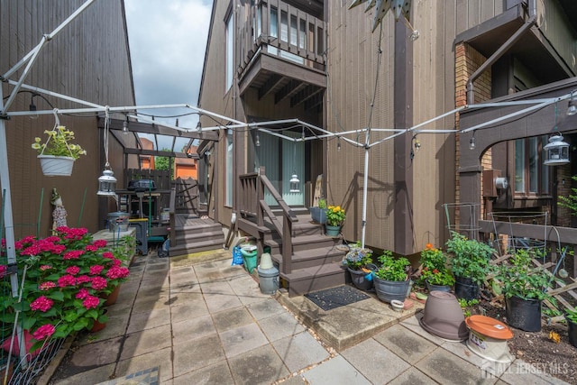 66 Riverbend Dr, North Brunswick, NJ 08902 - property entrance featuring a patio area and a deck