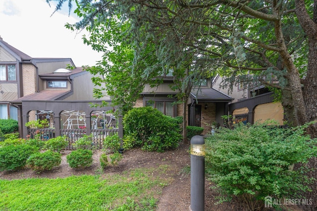 66 Riverbend Dr, North Brunswick, NJ 08902 - view of front of property with brick siding