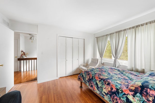 66 Riverbend Dr, North Brunswick, NJ 08902 - bedroom with wood finished floors and a closet