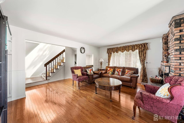 66 Riverbend Dr, North Brunswick, NJ 08902 - living area with wood-type flooring and stairway