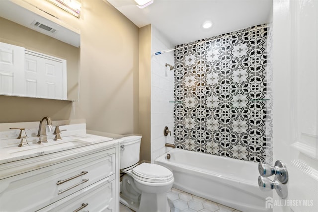1018 Schmidt Ln, North Brunswick, NJ 08902 - full bathroom featuring shower / washtub combination, toilet, tile patterned floors, and vanity