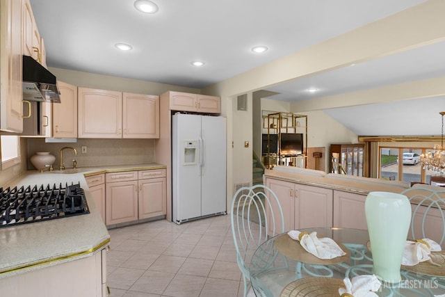 3 Hansen Rd, Old Bridge, NJ 08857 - kitchen featuring white refrigerator with ice dispenser, light countertops, black gas cooktop, range hood, and tasteful backsplash