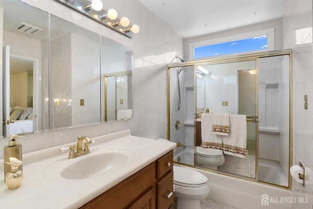 3 Hansen Rd, Old Bridge, NJ 08857 - full bathroom with toilet, tile walls, vanity, and connected bathroom