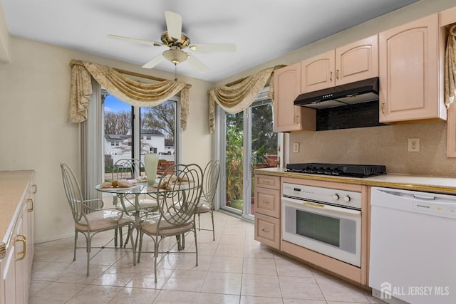 3 Hansen Rd, Old Bridge, NJ 08857 - kitchen with white appliances, under cabinet range hood, light countertops, and ceiling fan