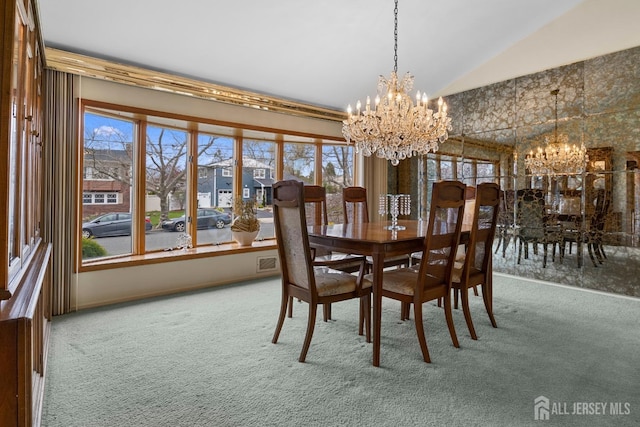 3 Hansen Rd, Old Bridge, NJ 08857 - carpeted dining room with a chandelier and lofted ceiling
