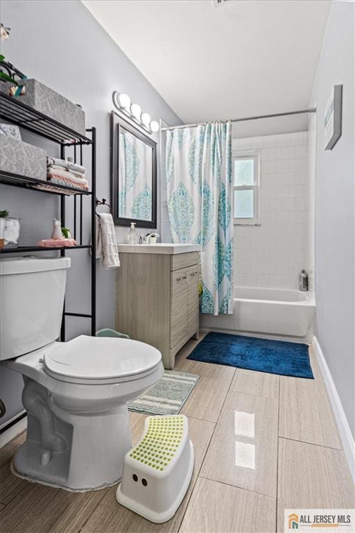 60 Sycamore St, Carteret, NJ 07008 - bathroom featuring vanity, shower / tub combo, and wood finished floors