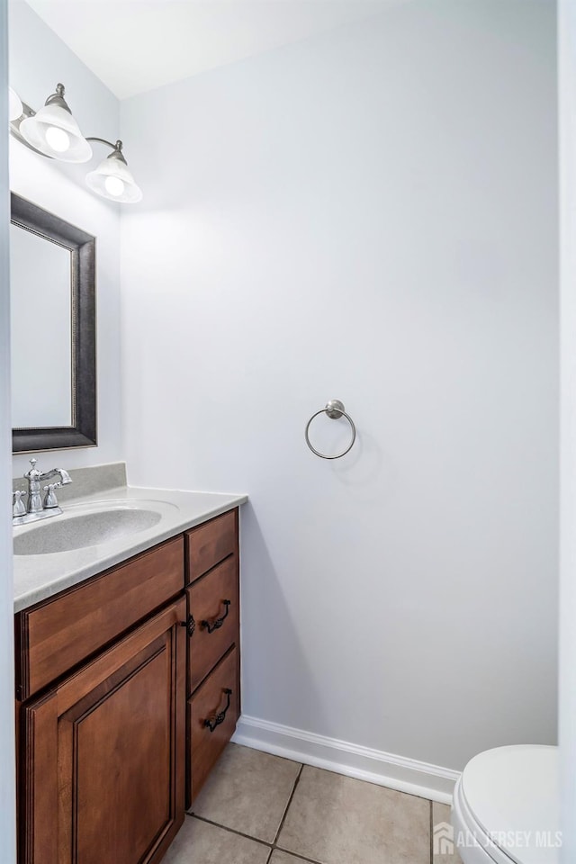 18 Albury Way N, Brunswick, NJ 08902 - bathroom featuring tile patterned flooring, vanity, toilet, and baseboards