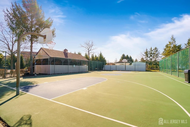 18 Albury Way N, Brunswick, NJ 08902 - view of sport court with community basketball court and fence