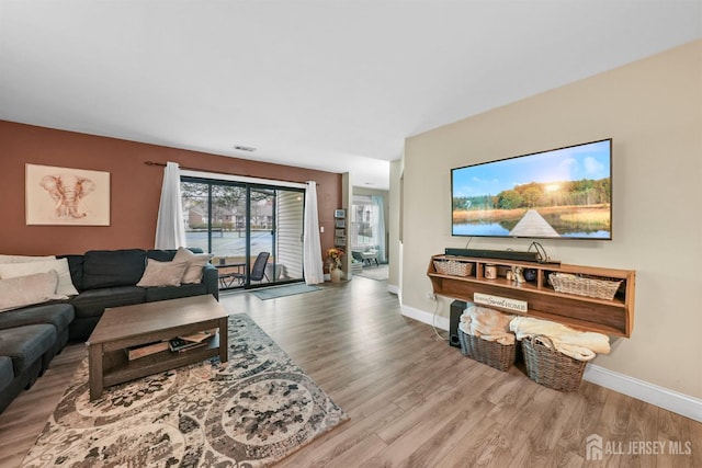 living room featuring light hardwood / wood-style flooring