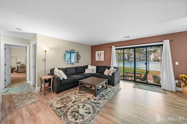 living room featuring light hardwood / wood-style floors