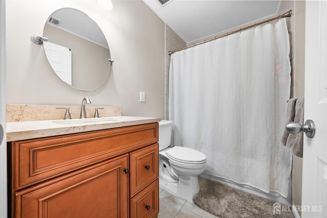 bathroom with vanity, curtained shower, tile patterned floors, and toilet