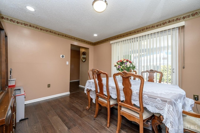 dining room with recessed lighting, baseboards, a textured ceiling, and dark wood-style floors