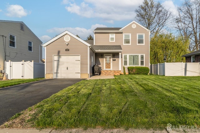 100-A George St, Carteret, NJ 07008 - traditional-style house with an attached garage, driveway, and a shingled roof