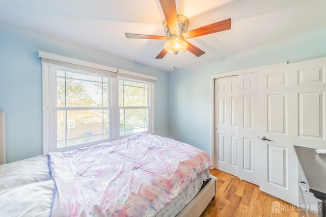 100-A George St, Carteret, NJ 07008 - bedroom featuring light wood-style floors, a closet, and ceiling fan