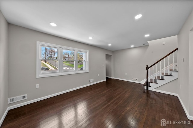 273 Park St, Franklin Twsp, NJ 08873 - unfurnished living room with hardwood / wood-style floors, baseboards, stairway, and recessed lighting