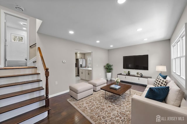 273 Park St, Franklin Twsp, NJ 08873 - living room with dark wood-style flooring, recessed lighting, stairway, and baseboards