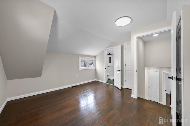 273 Park St, Franklin Twsp, NJ 08873 - additional living space with hardwood / wood-style floors, vaulted ceiling, and baseboards