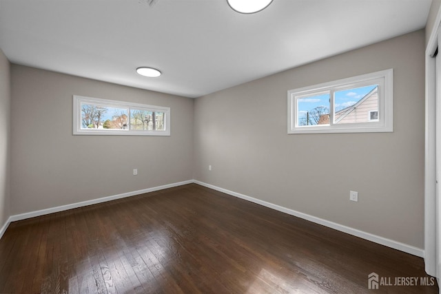 273 Park St, Franklin Twsp, NJ 08873 - empty room featuring baseboards and healthy amount of natural light